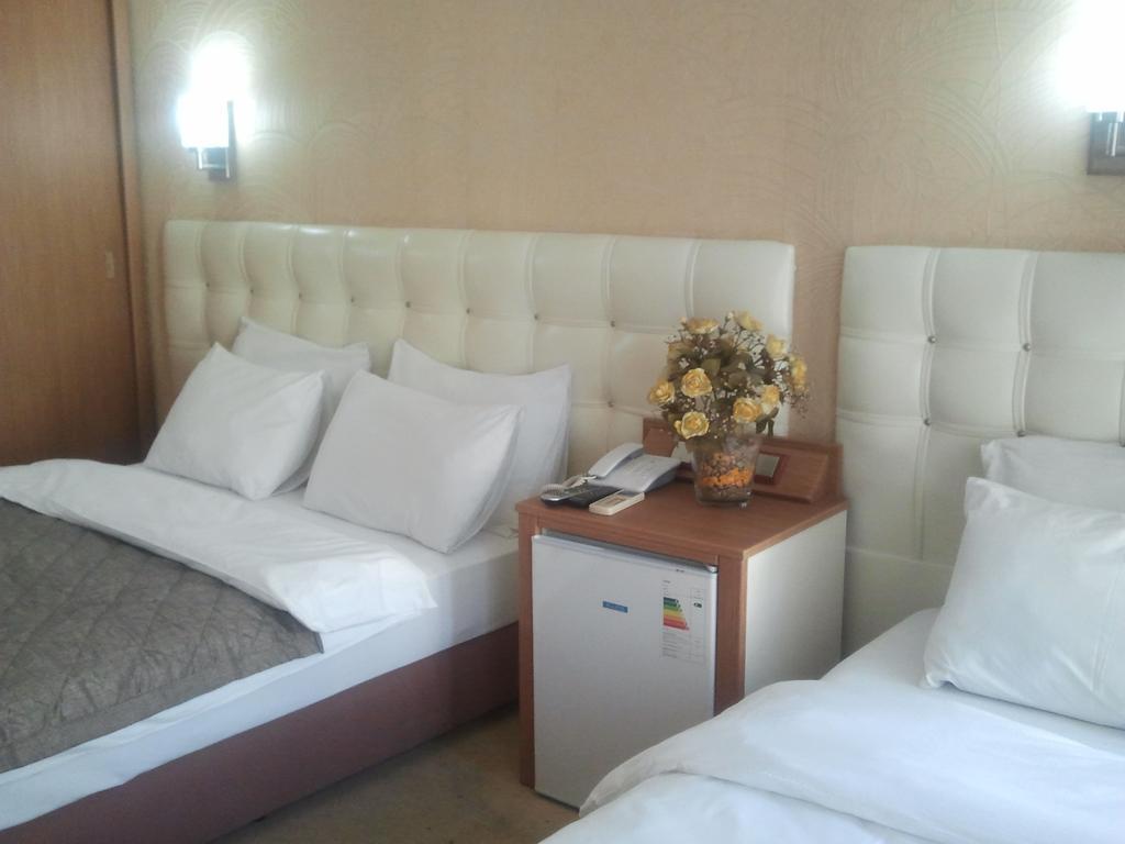 Hotel Kocaman Измир Номер фото
