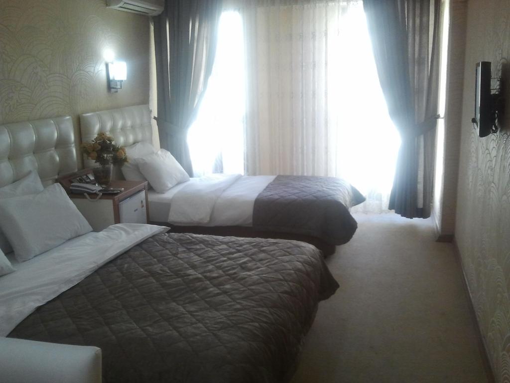 Hotel Kocaman Измир Номер фото