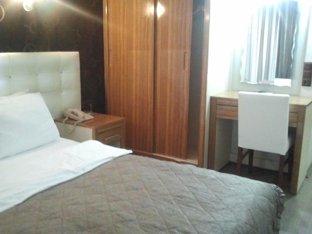 Hotel Kocaman Измир Номер фото