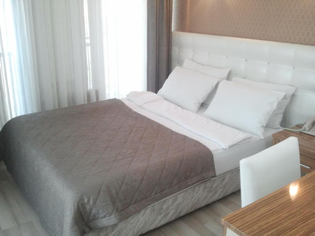 Hotel Kocaman Измир Номер фото
